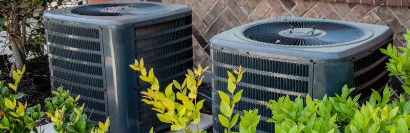 HVAC technician performing AC repair service in San Diego CA home